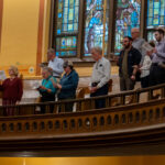 Concertgoers in the Meetinghouse's balcony sing along at a concert on October 4, 2026.