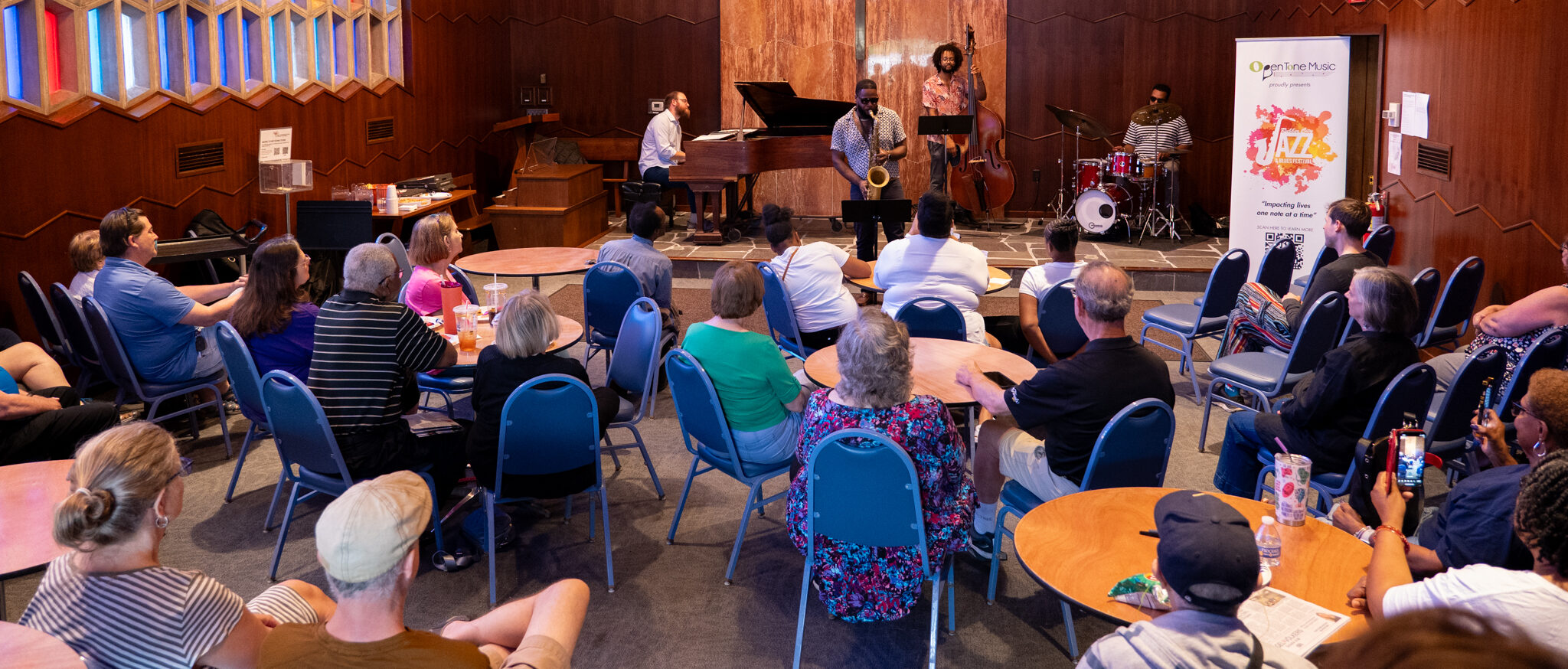 A Jazz Ensemble performing for a crowd at the AkronFCC Chapel.